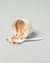 Spills Cup Ice Cream Spill on light color background.