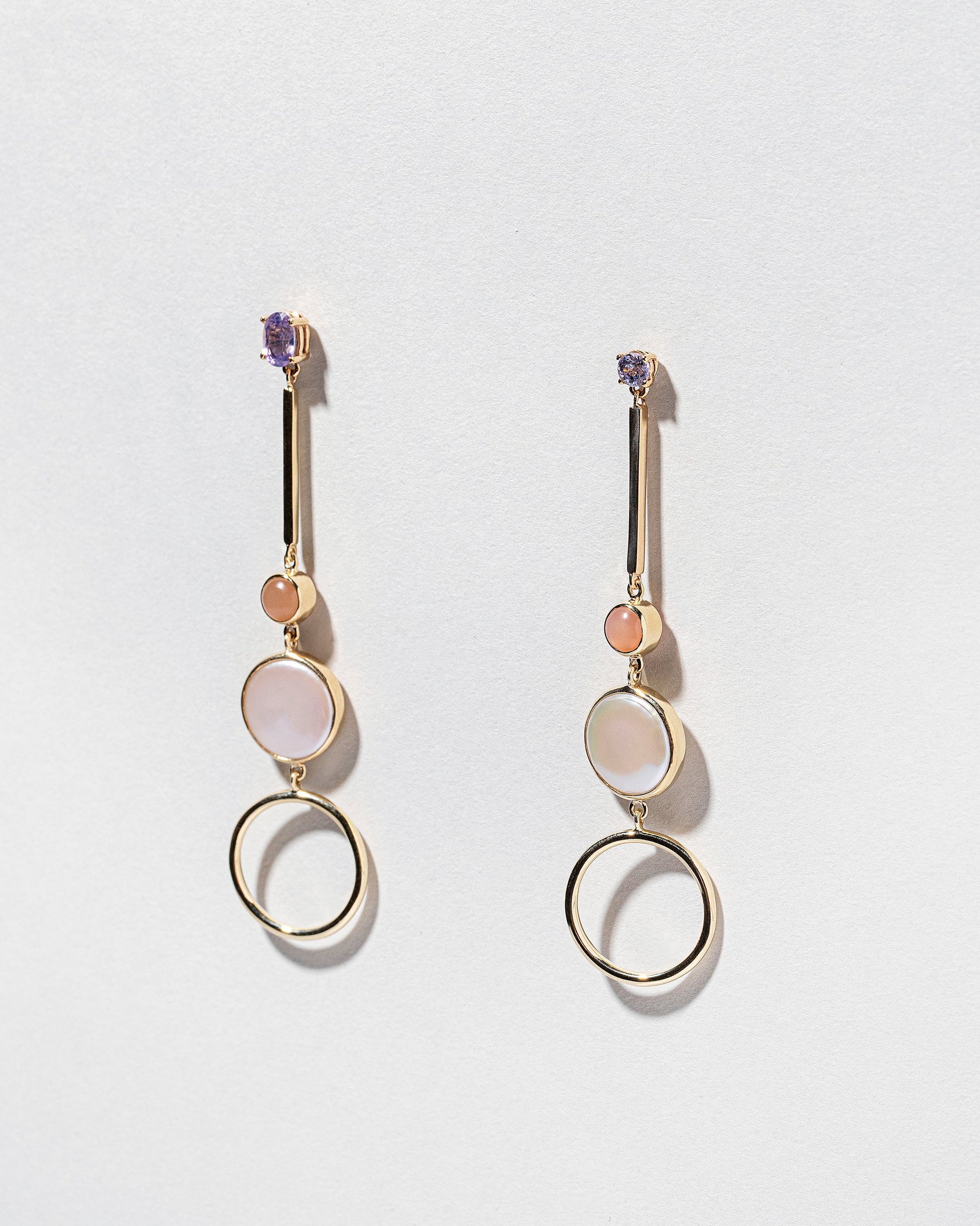  Act 3. Earrings on light color background.