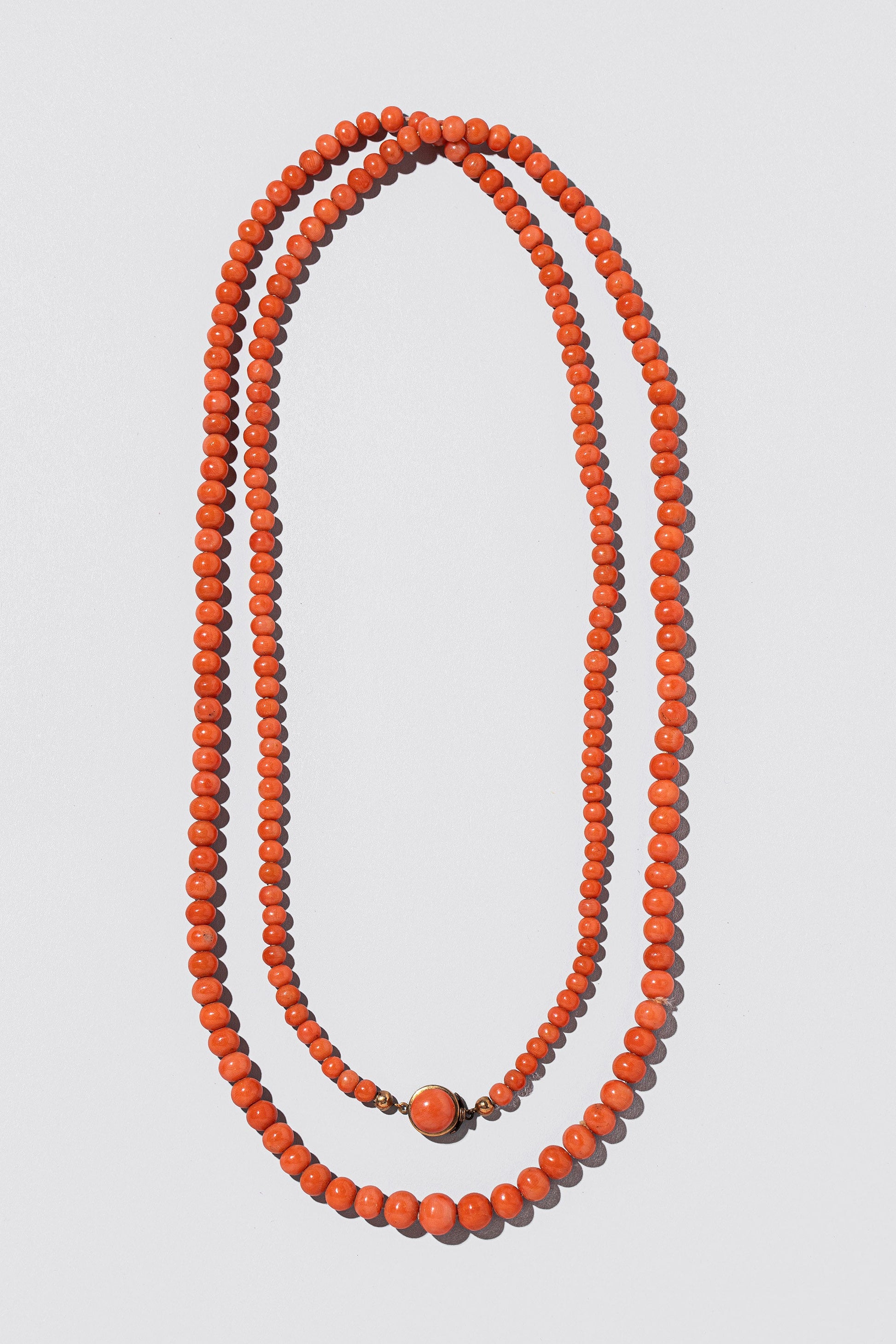  Coral Necklace on light color background.