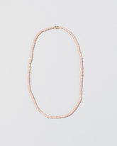  Seed Pearl Choker on light color background.