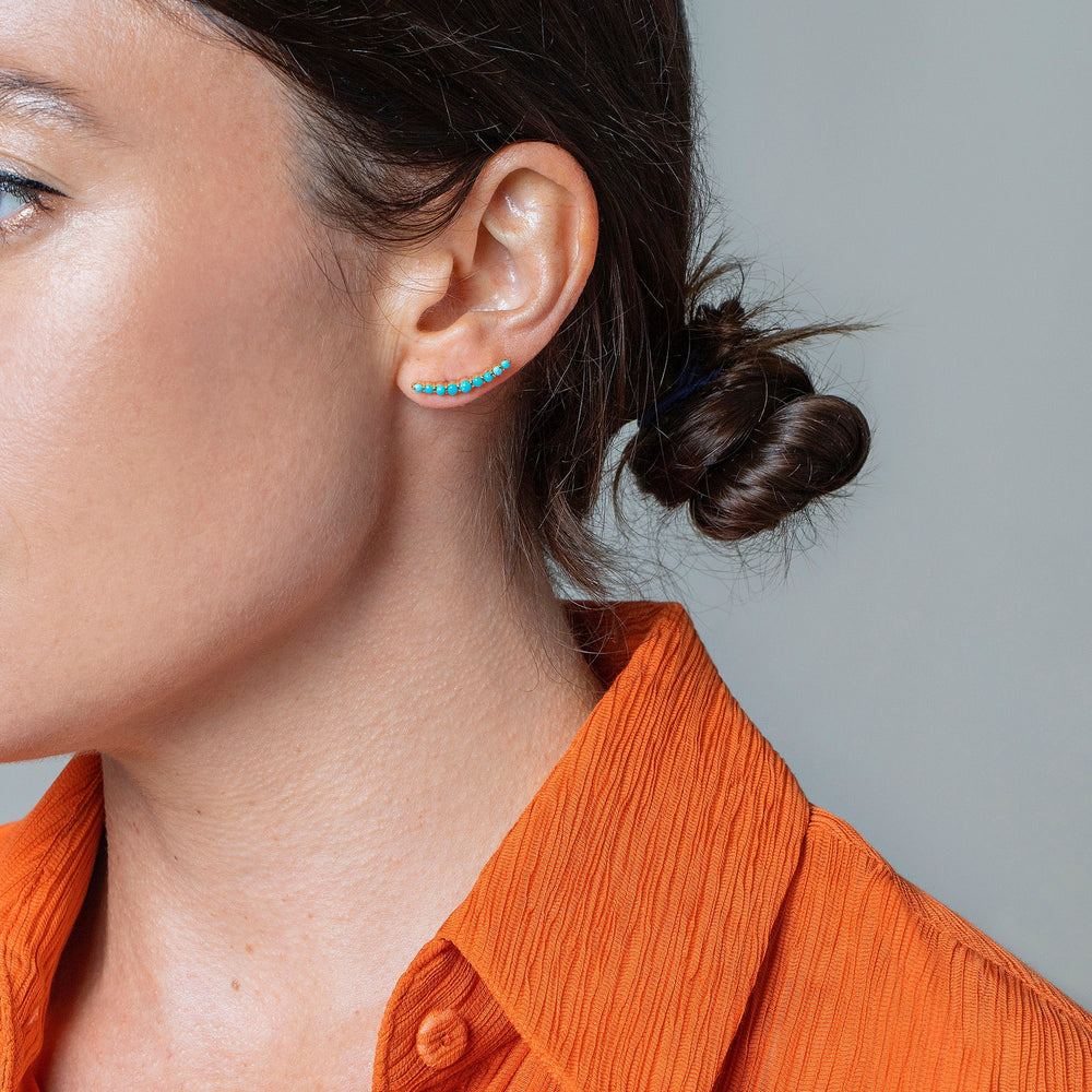 product_details::Cresecent Ear Climber Stud Earrings on model.