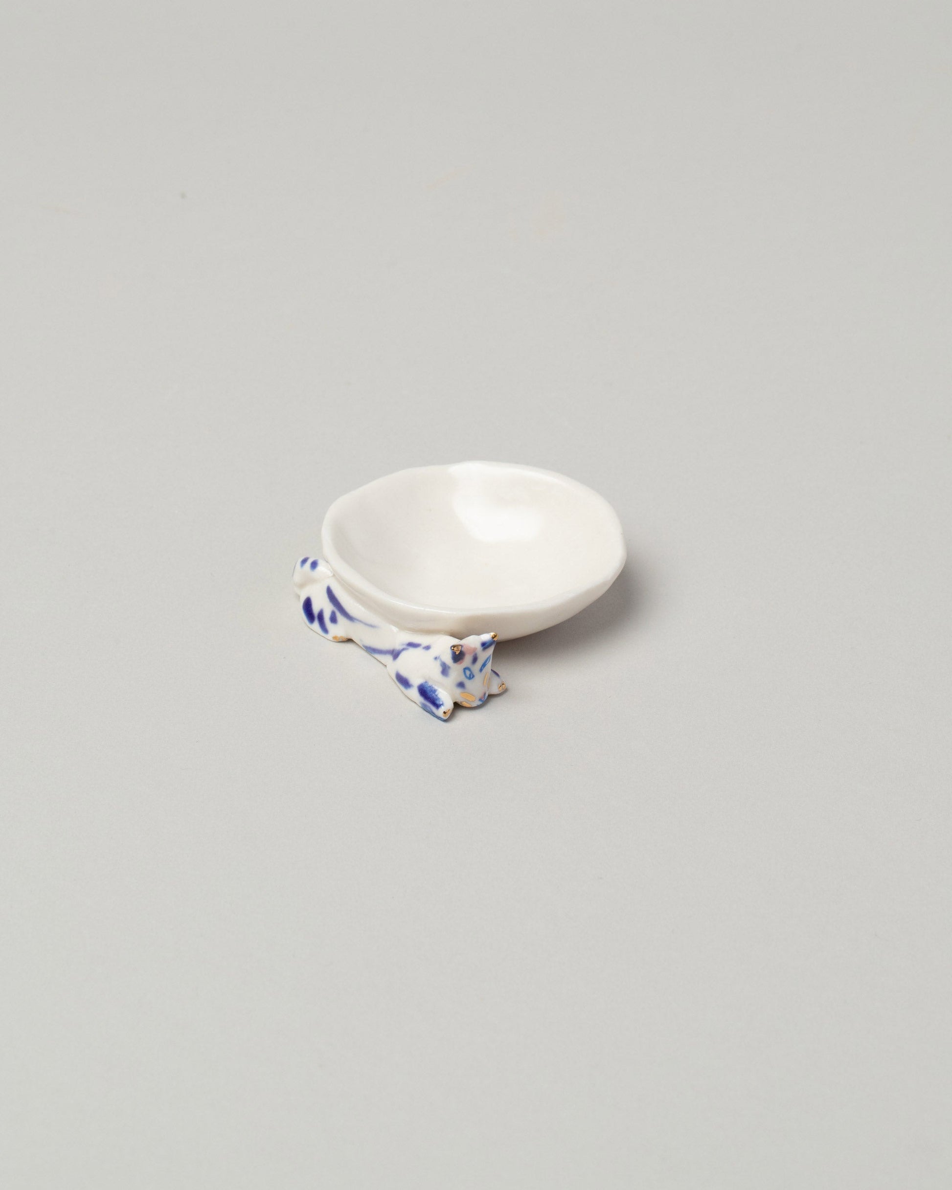 Eleonor Boström Blue Spots Mini Cat Dish on light color background.