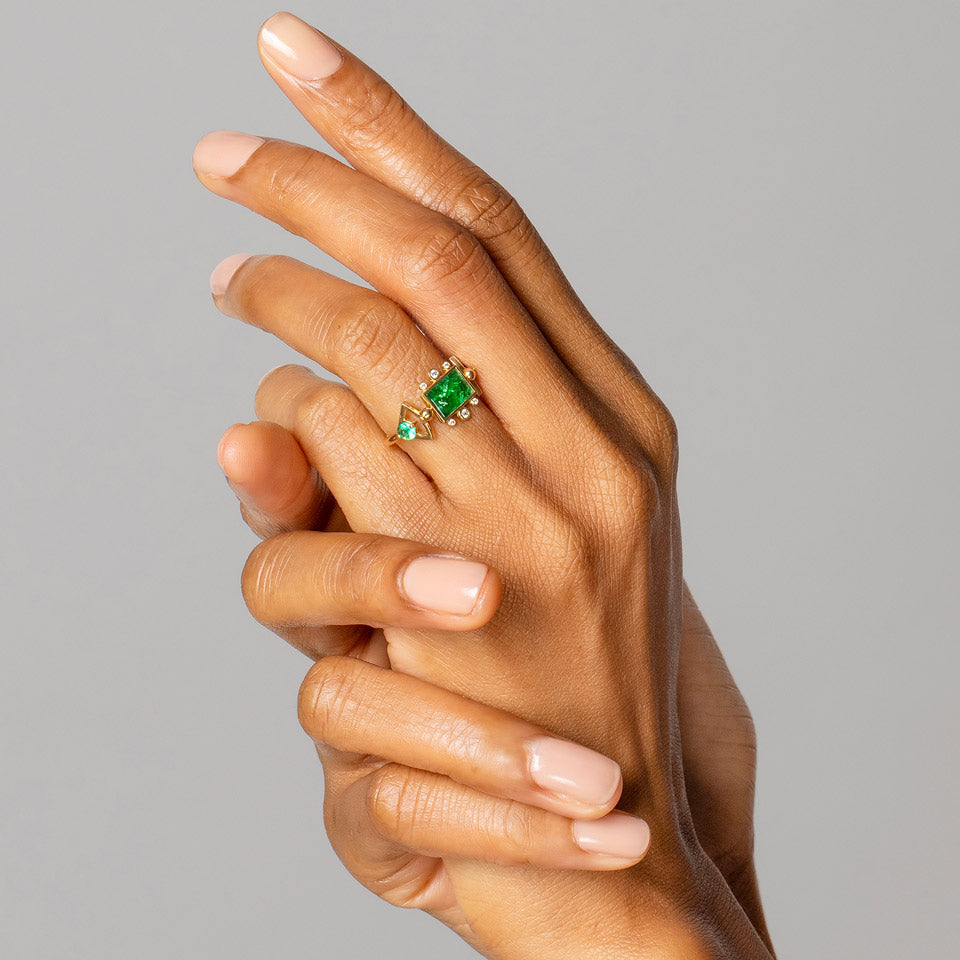 product_details::Emerald Lotus Ring on model.