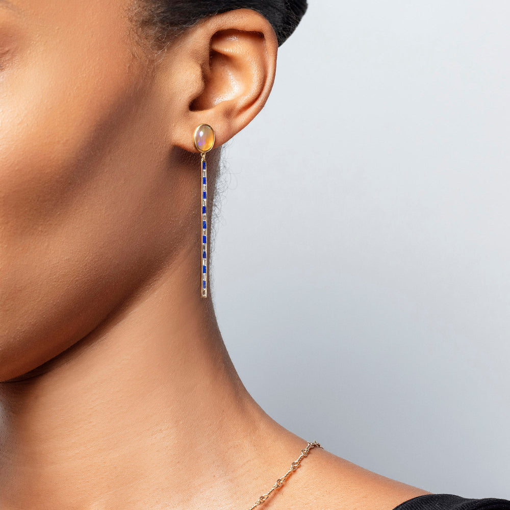 product_details::Ethiopian Opal Transformation Earrings on model.