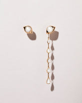  Pearl Transformation Earrings on light color background.