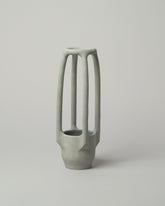  Solenne Belloir Grey Rod Vase on light color background.