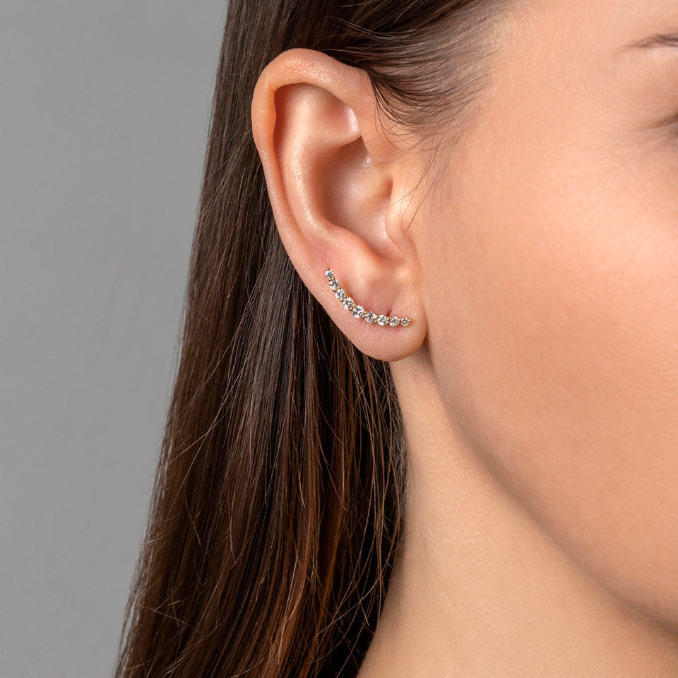 product_details::Crescent Ear Climber Studs on model.