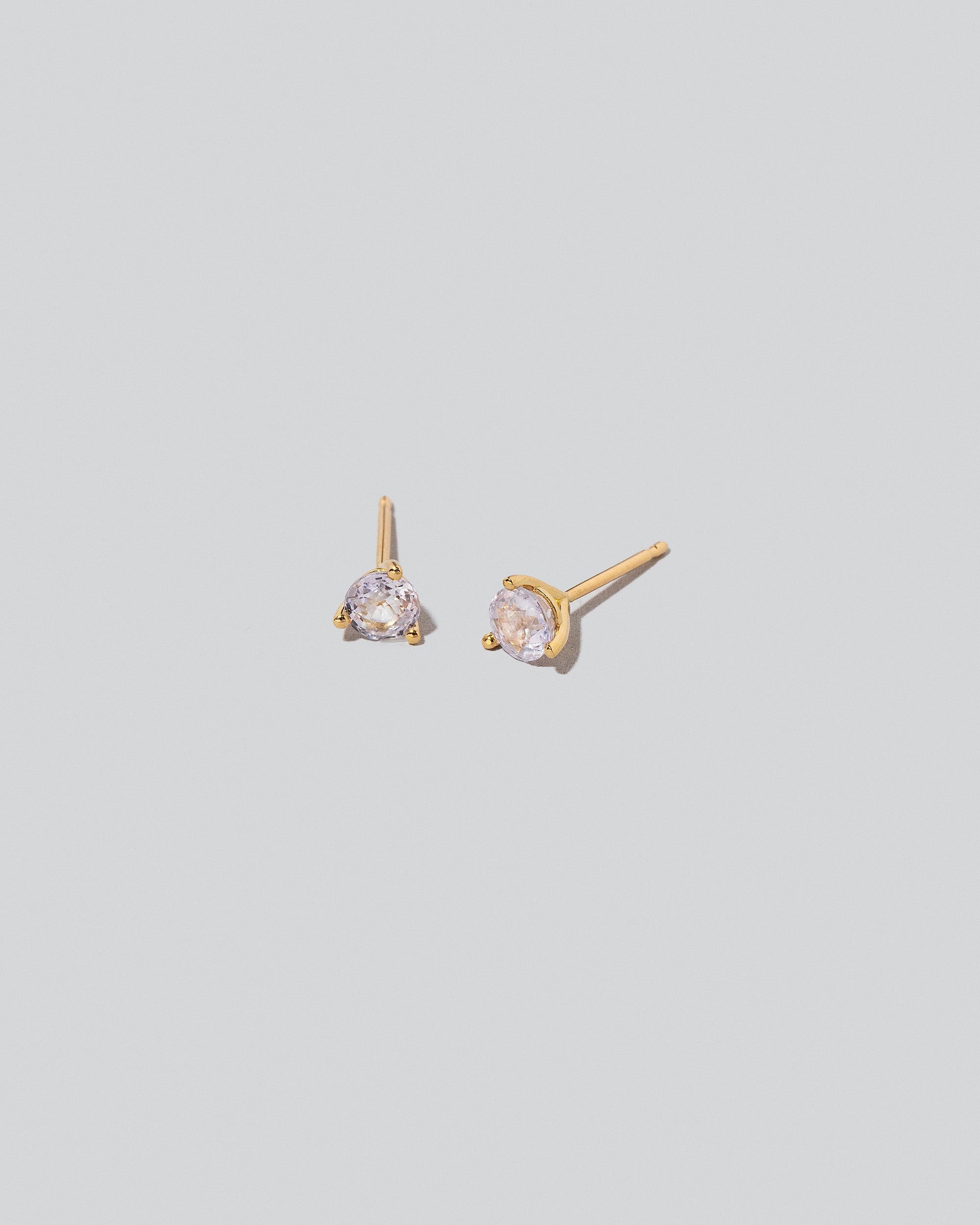 Martini Stud Earrings on light colored background.