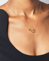 Symbol of Change Necklace on model.