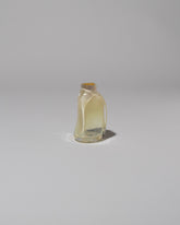 BaleFire Glass Small Vanilla Suspension Vase on light color background.