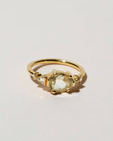  Light Green Grossular Garnet Cluster Ring on light color background.