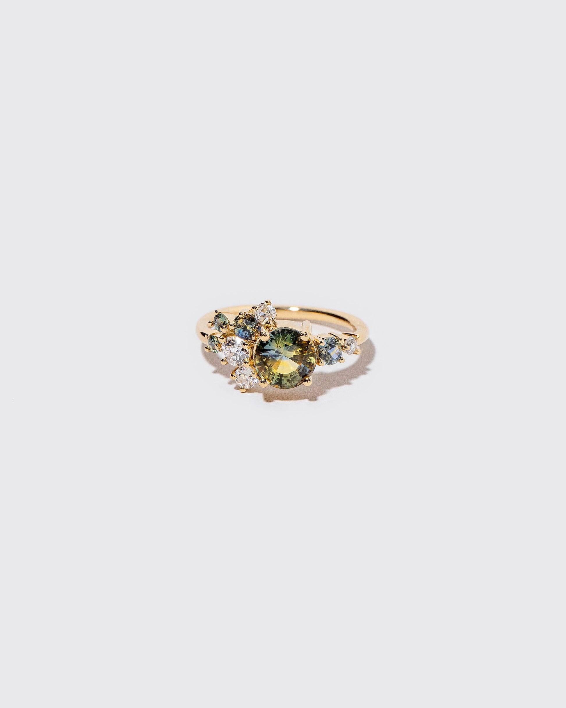  Vega Ring - Bicolor Sapphires on light color background.