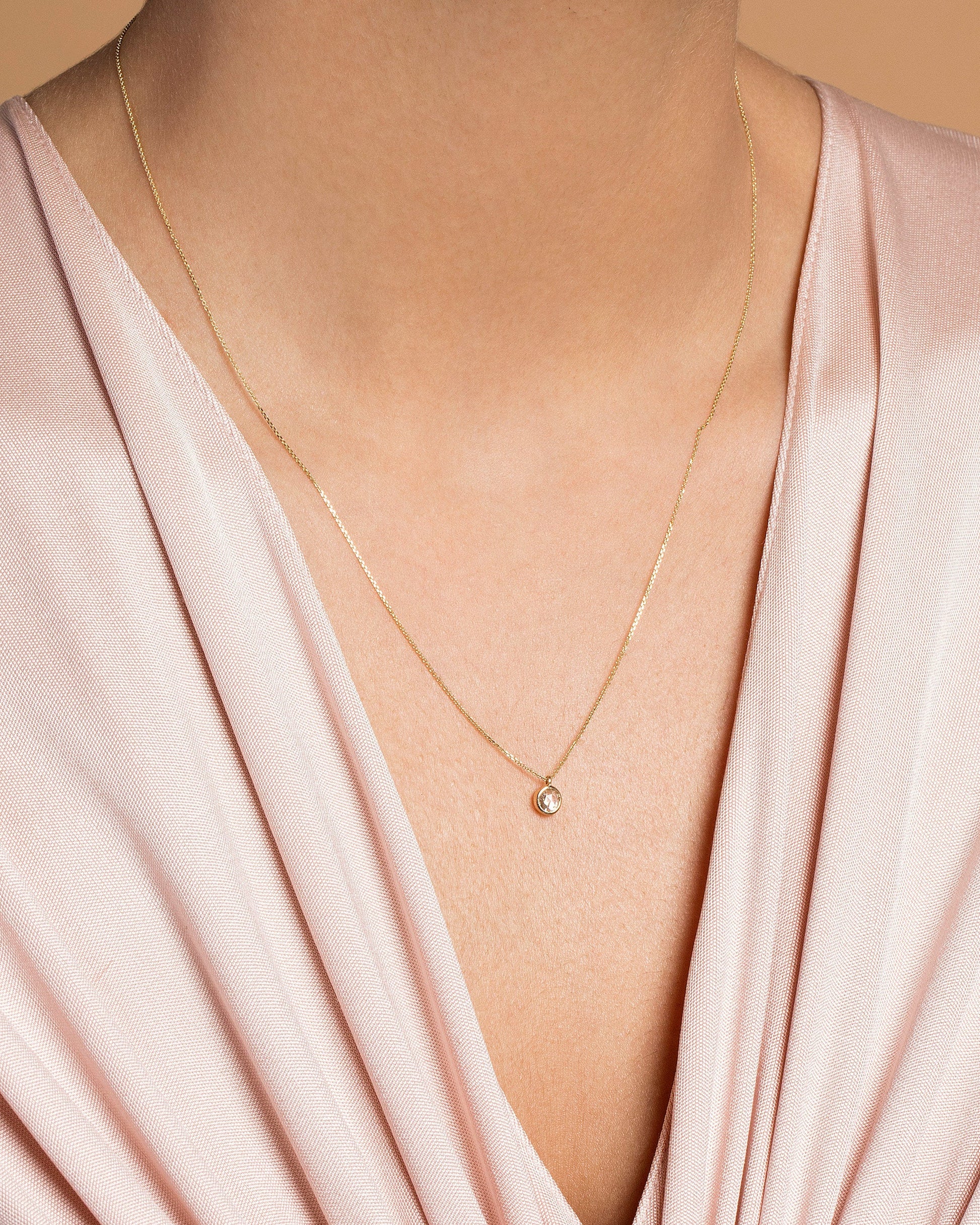 Diamond Birthstone Necklace on model.