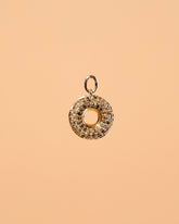 Chocolate Donut Charm on light color background.