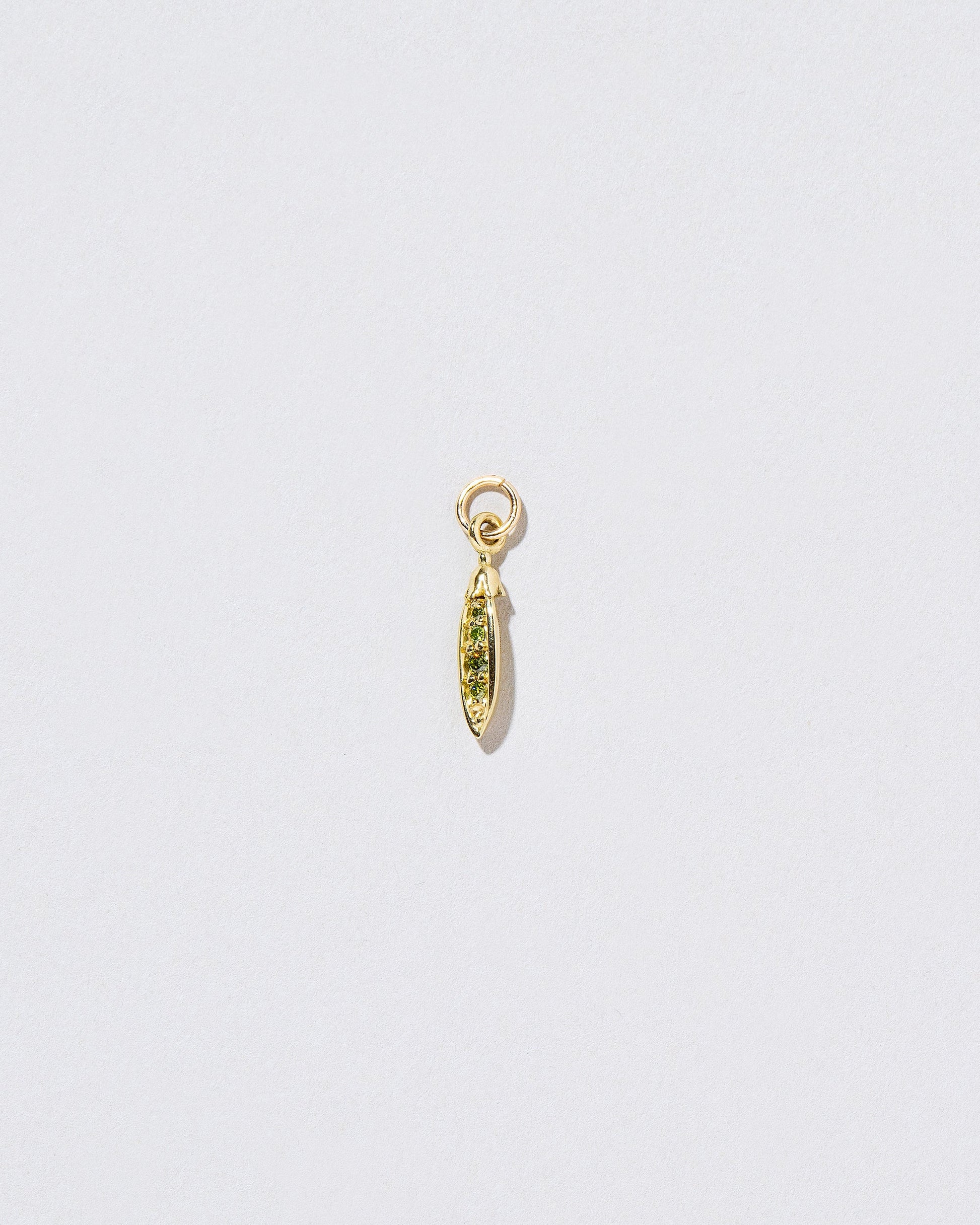  Snap Pea Charm on light color background.