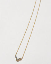  Baguette Bar Necklace on light color background.