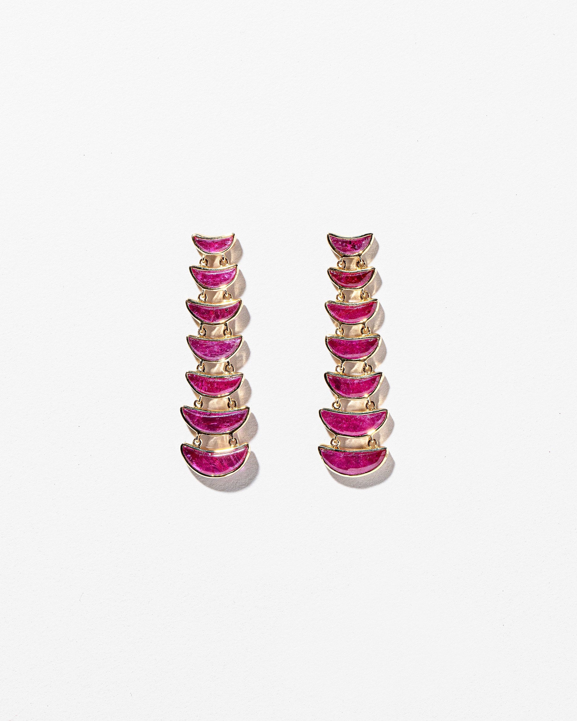  Flame Earrings on light color background.