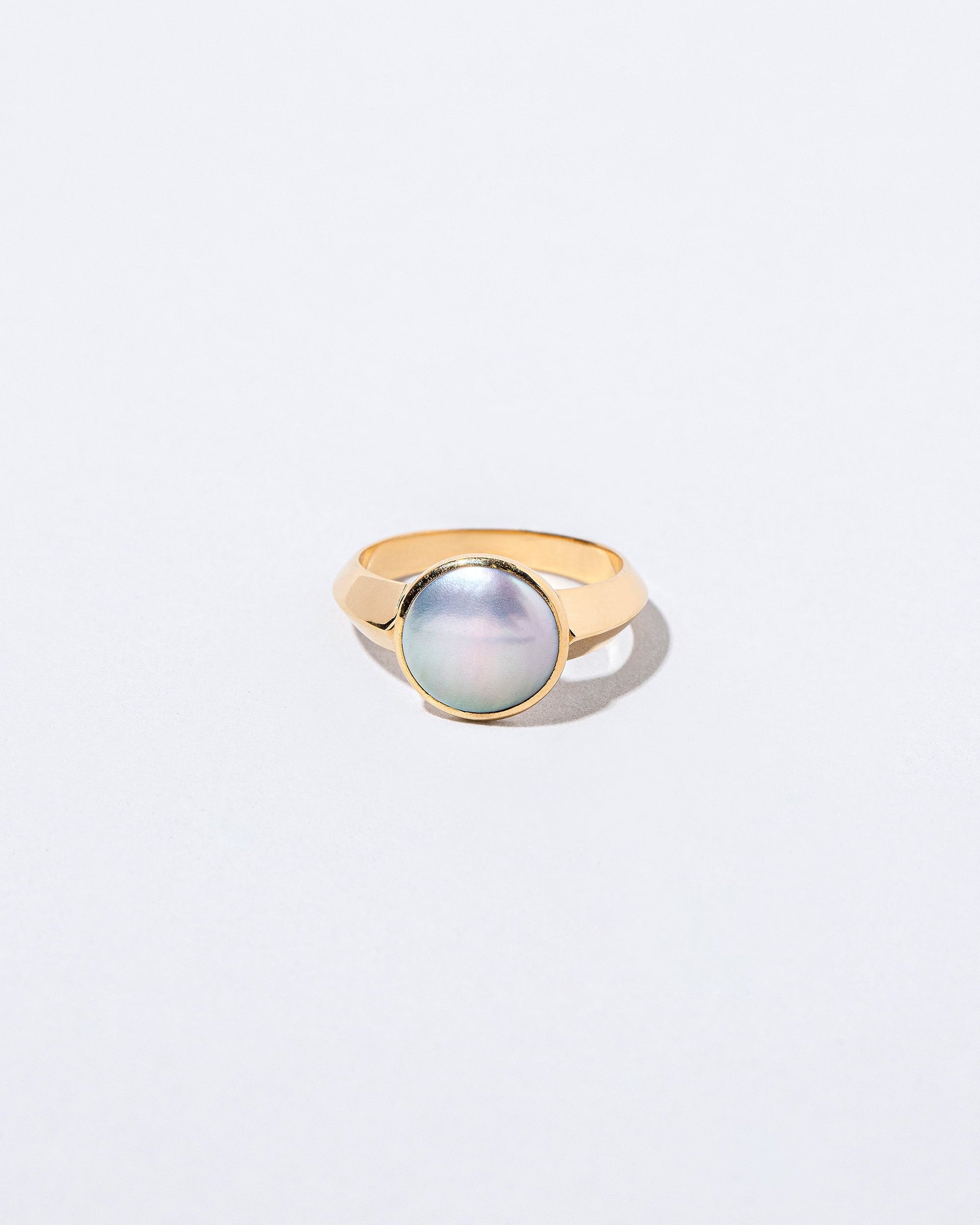  Secret Ring set Cortez Mabe pearl on light color background.