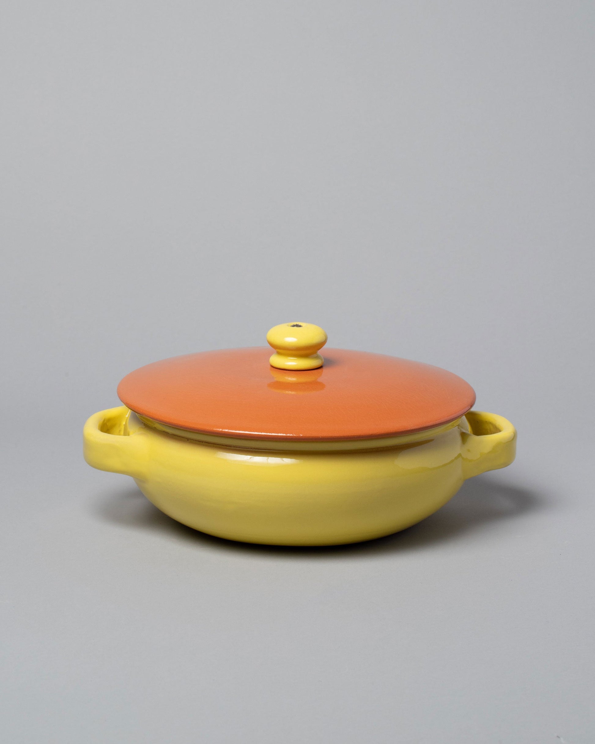  Mazzotti 1903 Small Yellow and Orange Clay Pot on light color background.