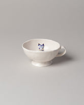 Eleonor Boström Blue Spots Cat Cup on light color background.