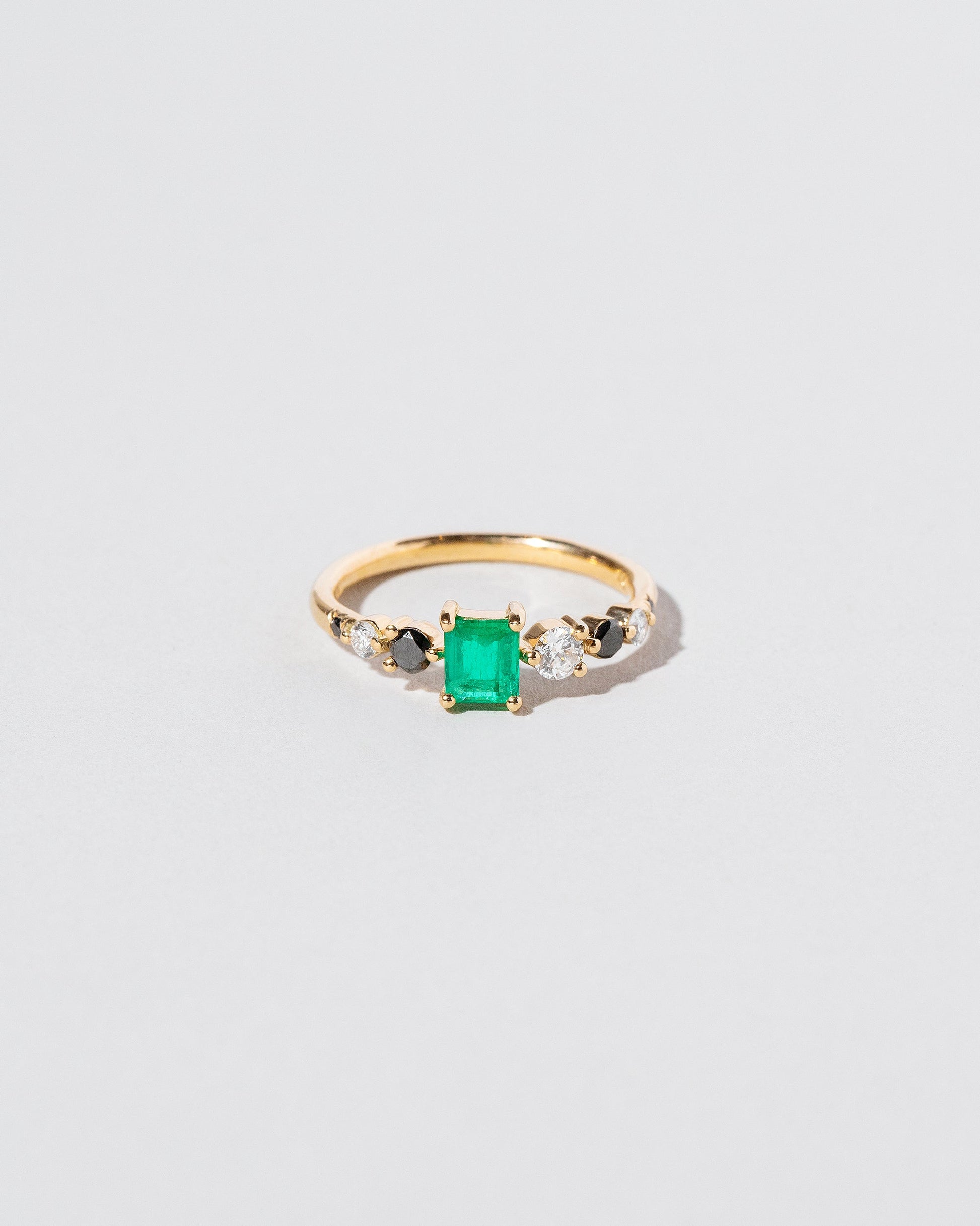  Seven Sisters Ring - Emerald on light color background.