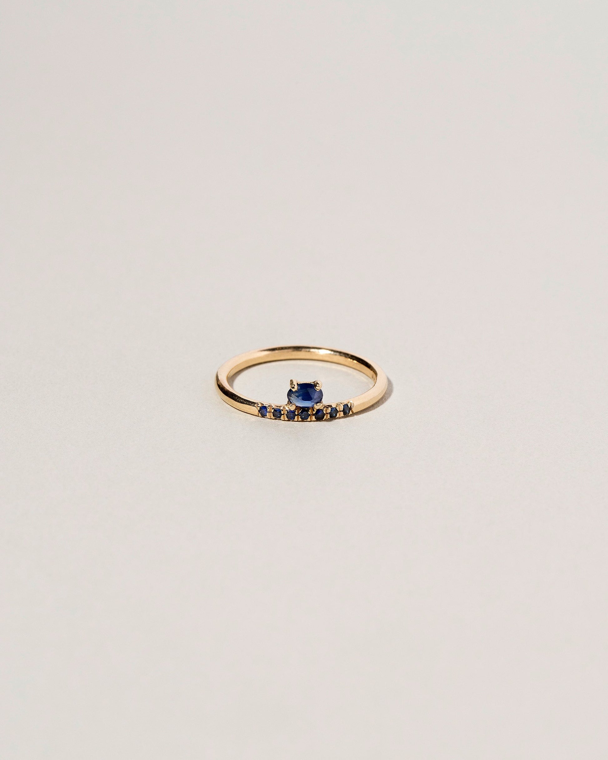  Stacked Ring - Sapphire & Black Diamond on light color background.