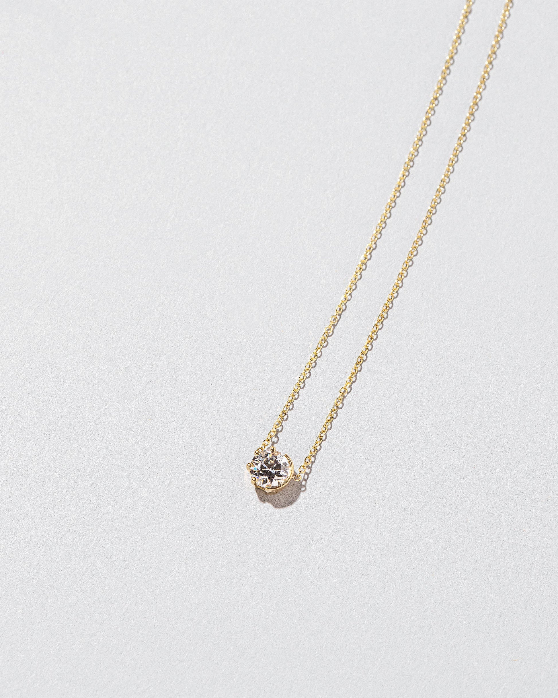  Sun & Moon Necklace - White Diamond on light color background.