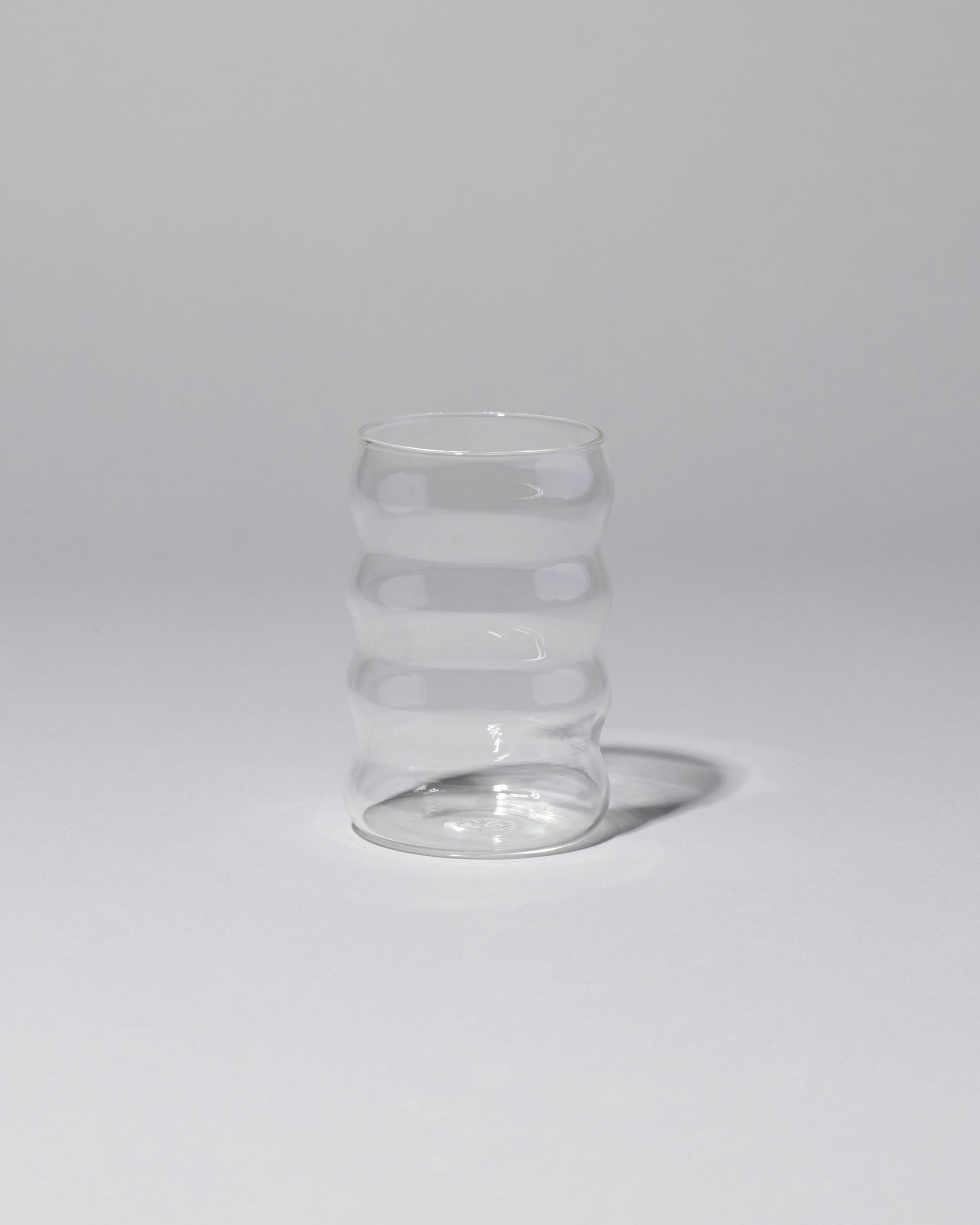 Sophie Lou Jacobsen Large Clear Single Ripple Cup on light color background.