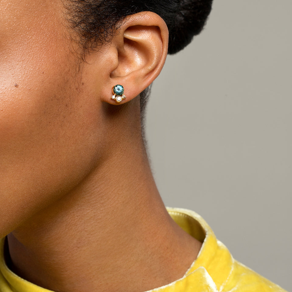 product_details::Vega Earrings - Blue Sapphire on model.