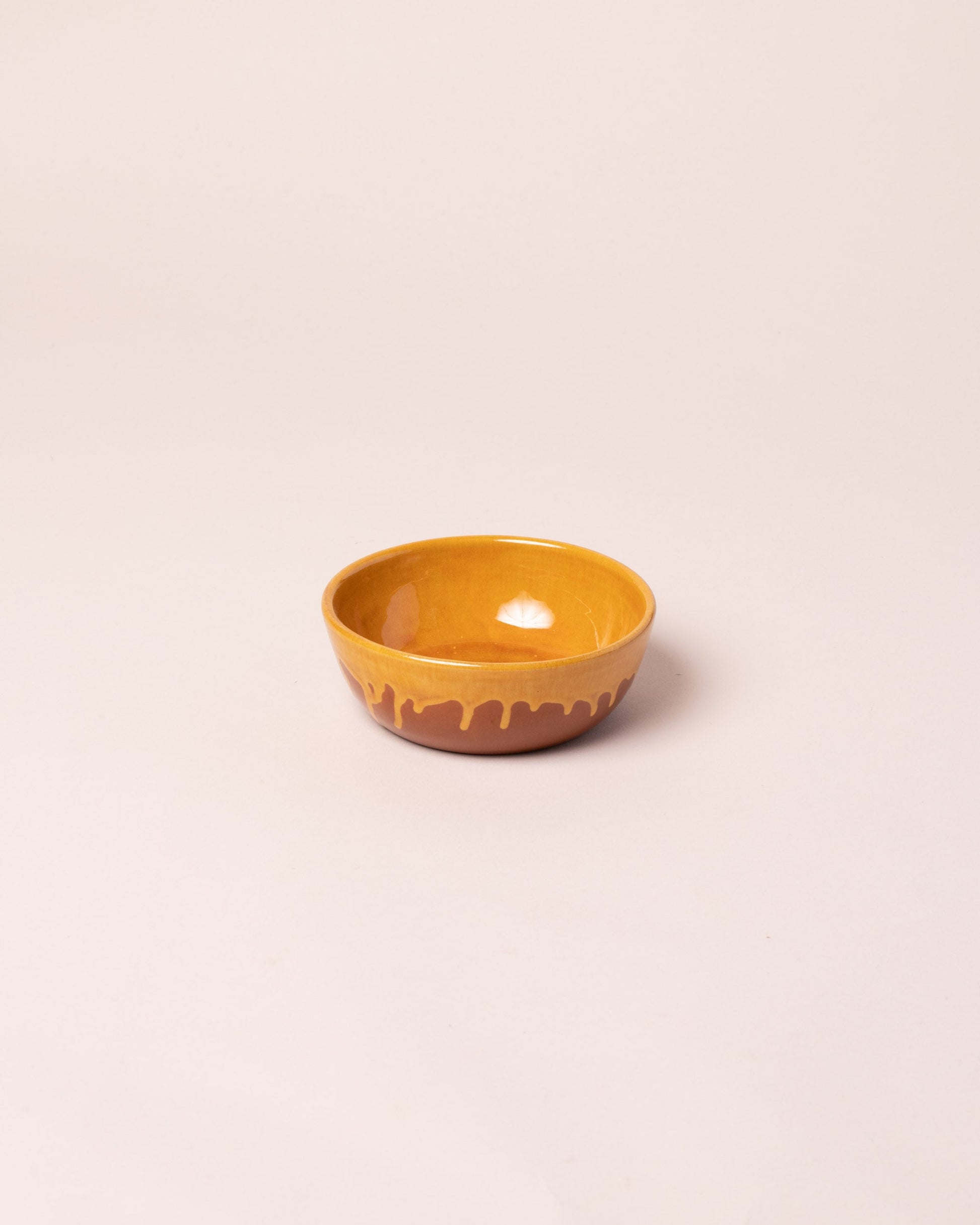 La Ceramica Vincenzo Del Monaco Caramel Yellow Dessert Bowl on light color background.
