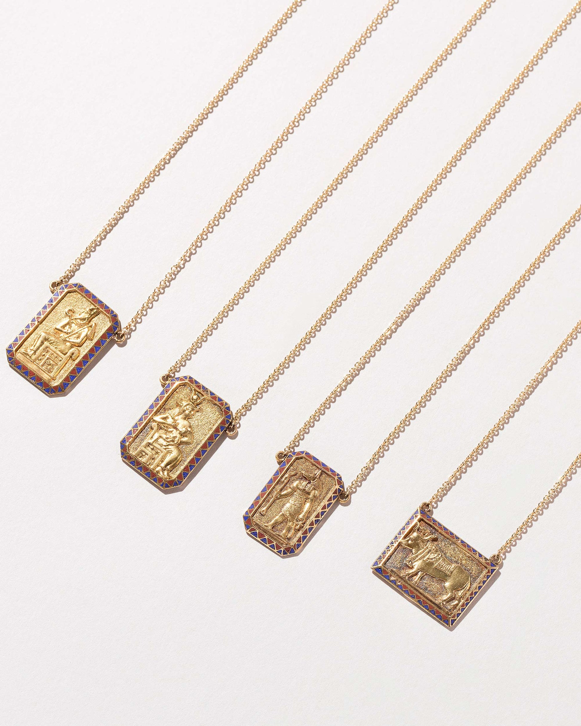 Group of  Deity Necklace on light color background.
