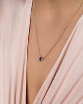 Sapphire Sun & Moon Necklace on model.