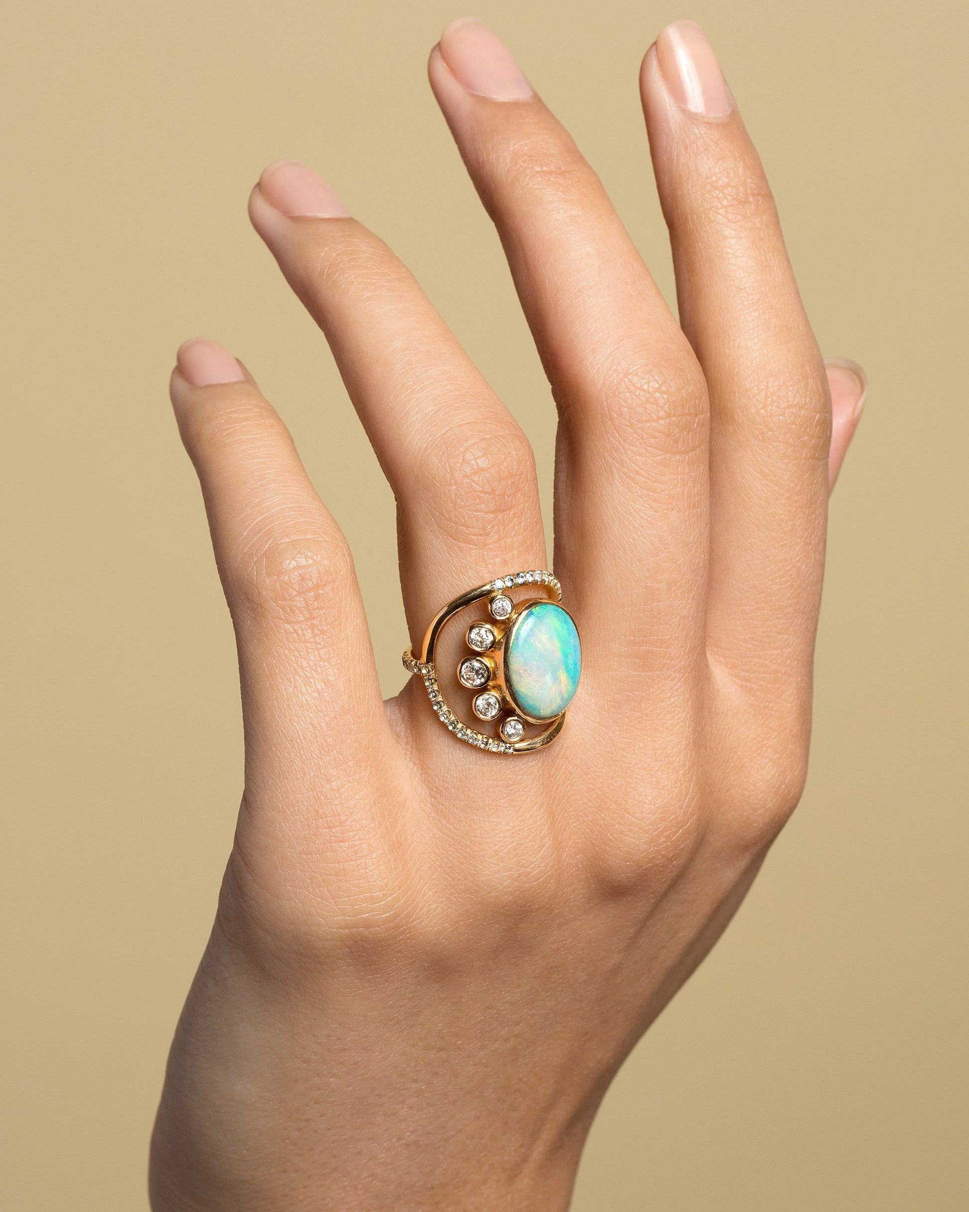 Australian Opal, Diamond & Sapphire Ring on model.