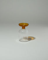 Ichendorf Milano Small Lotus Oil Bottle on light colored background.