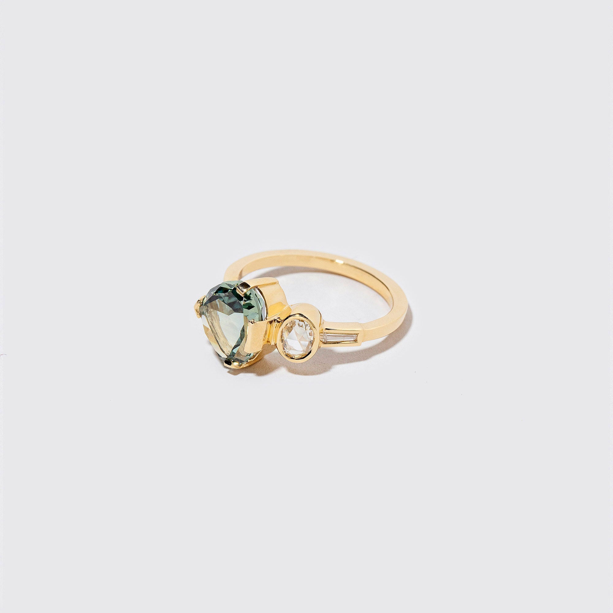 product_details:: Xanadu Ring on light color background.