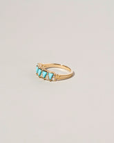  Five Triangle Ring - Turquoise on light color background.