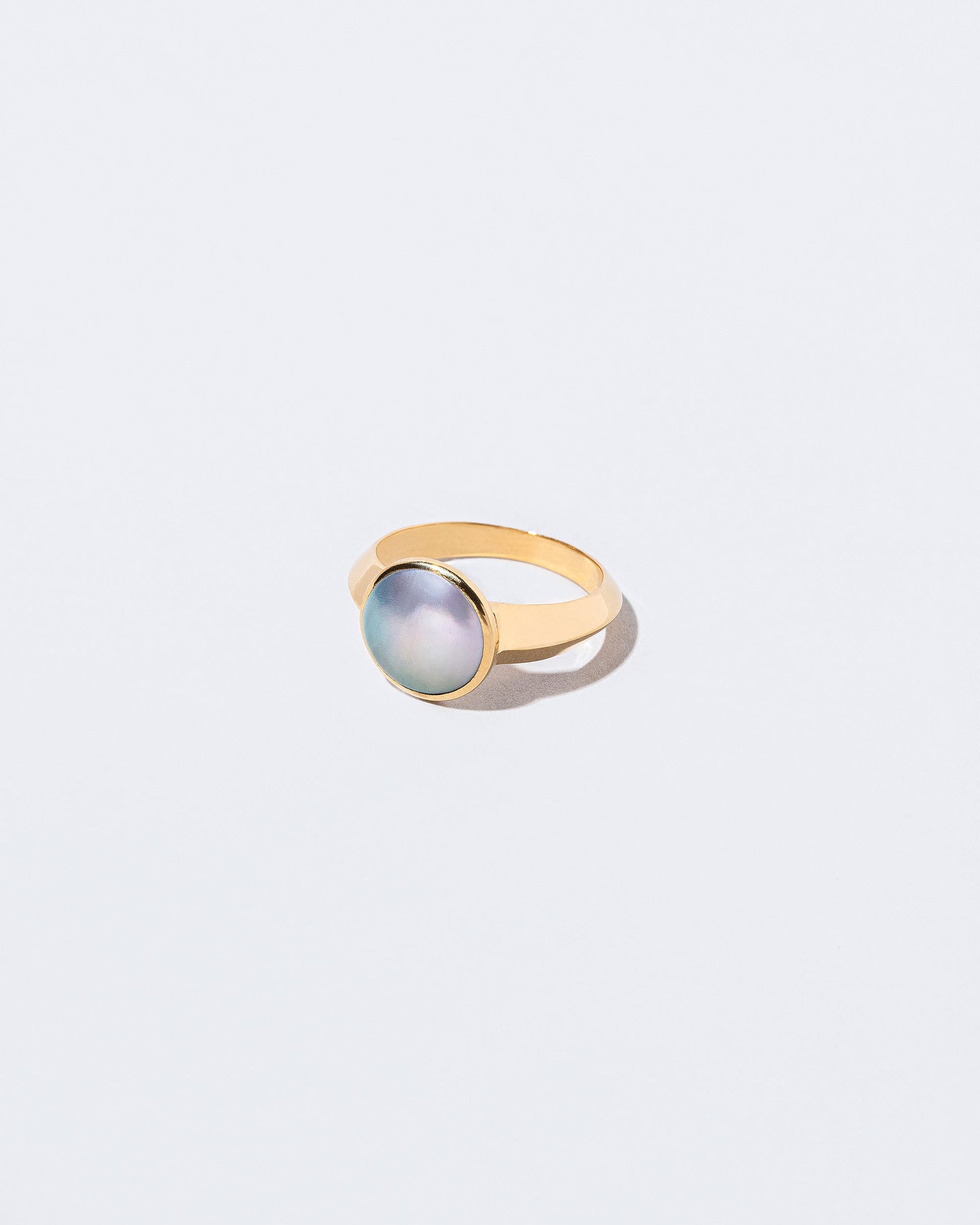  Secret Ring set Cortez Mabe pearl on light color background.