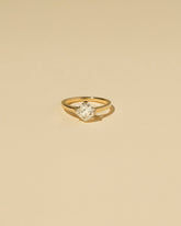  Cushion Modified Brilliant Diamond Solitaire Ring on light color background.