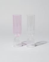 Group of Ichendorf Milano Pink and Clear Tutu Flutes on light color background.