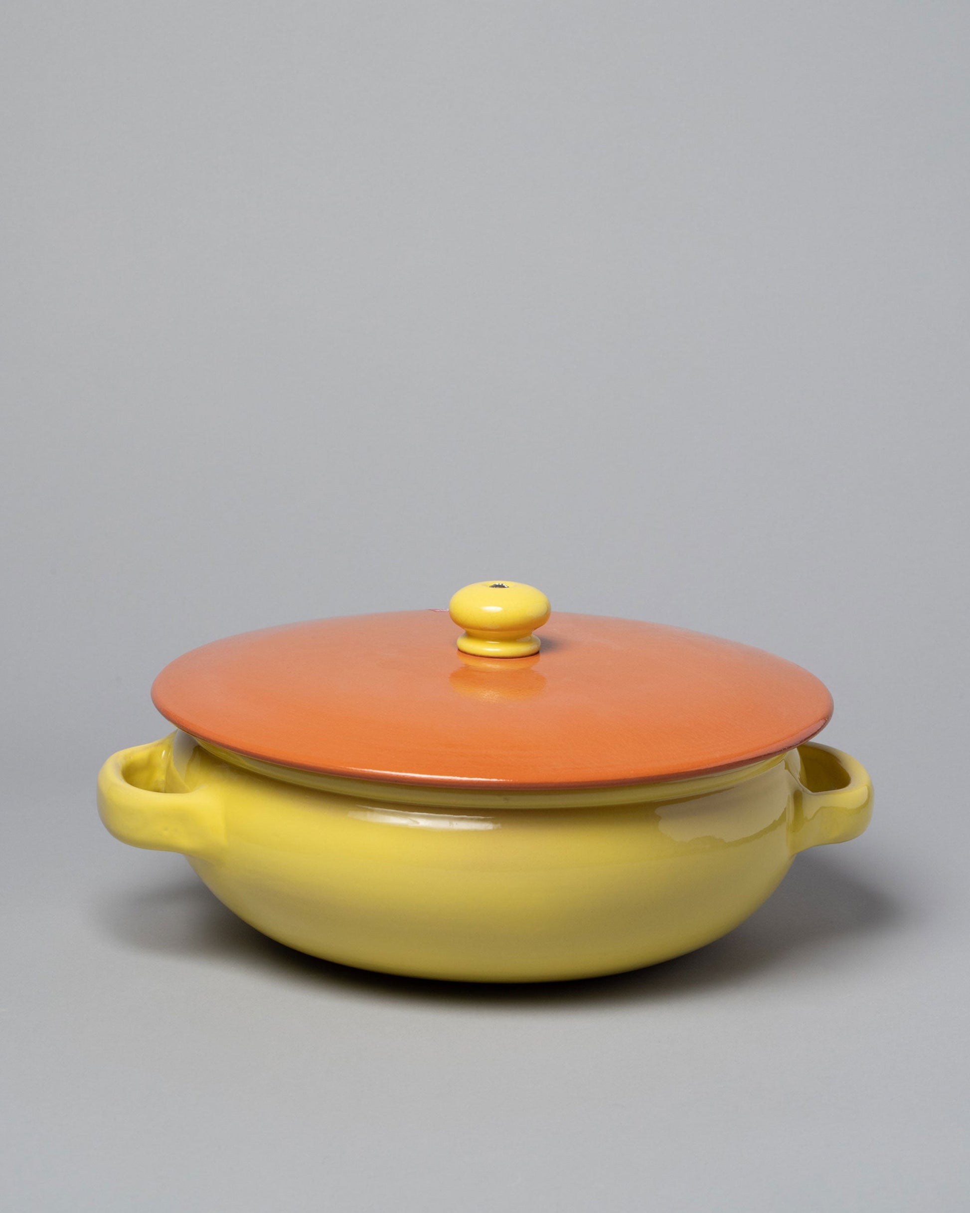  Mazzotti 1903 Large Yellow and Orange Clay Pot on light color background.