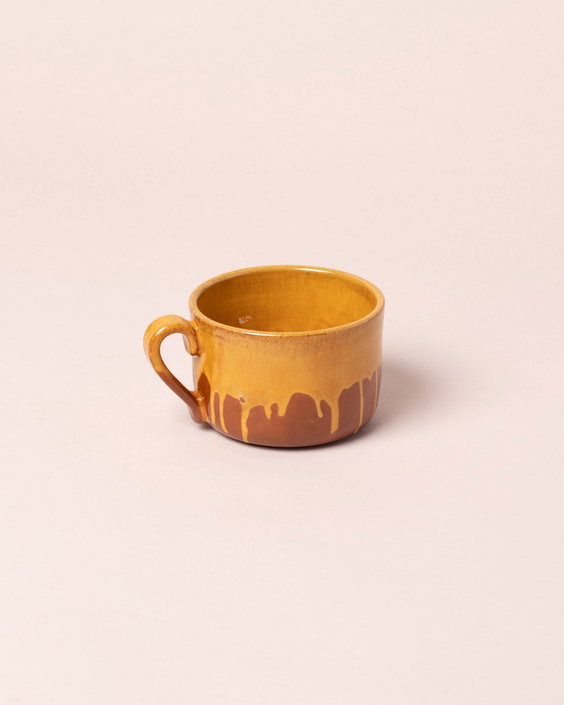 La Ceramica Vincenzo Del Monaco Caramel Yellow Tea Mug on light color background.