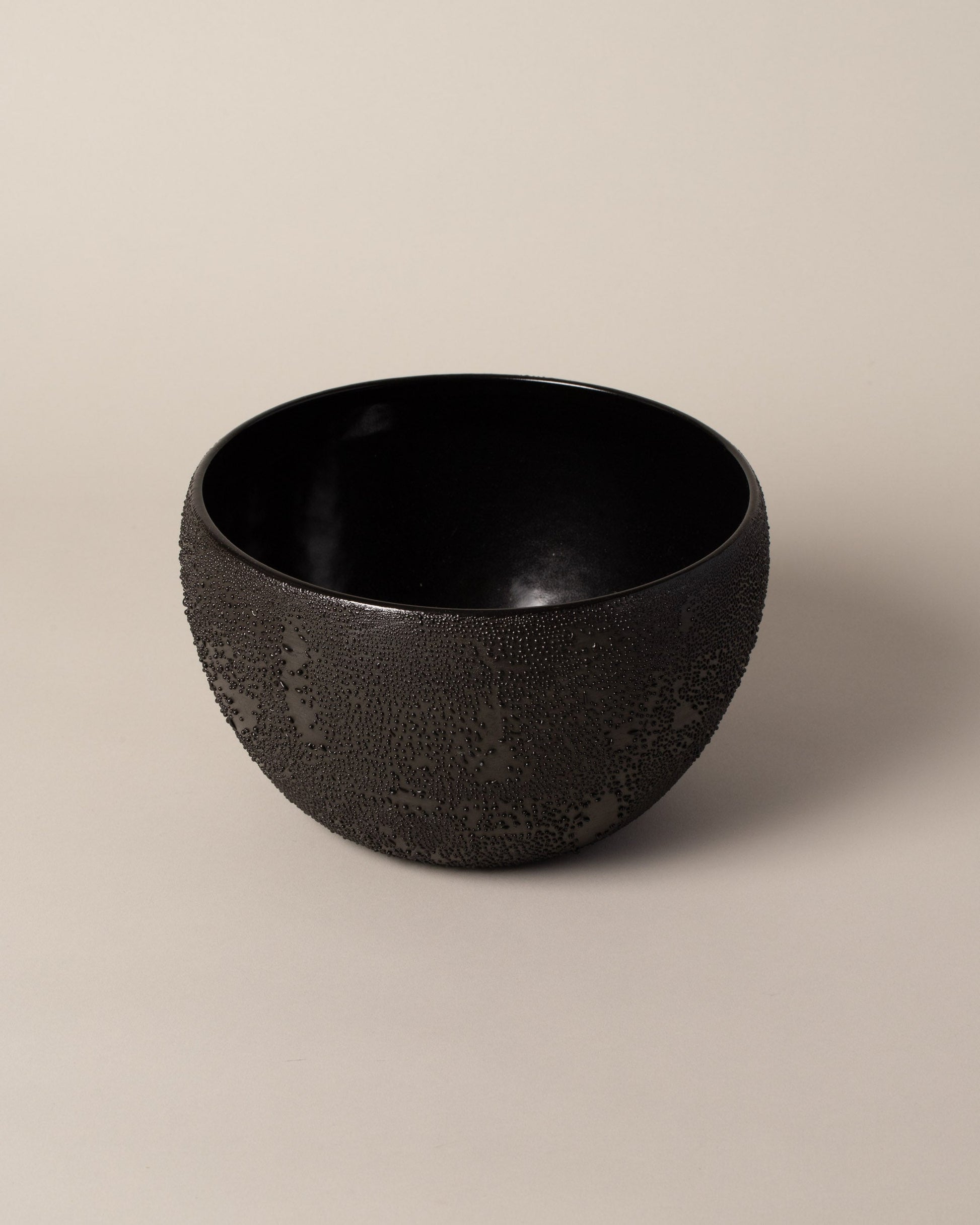  Malka Dina Dew Serving Bowl on light color background.