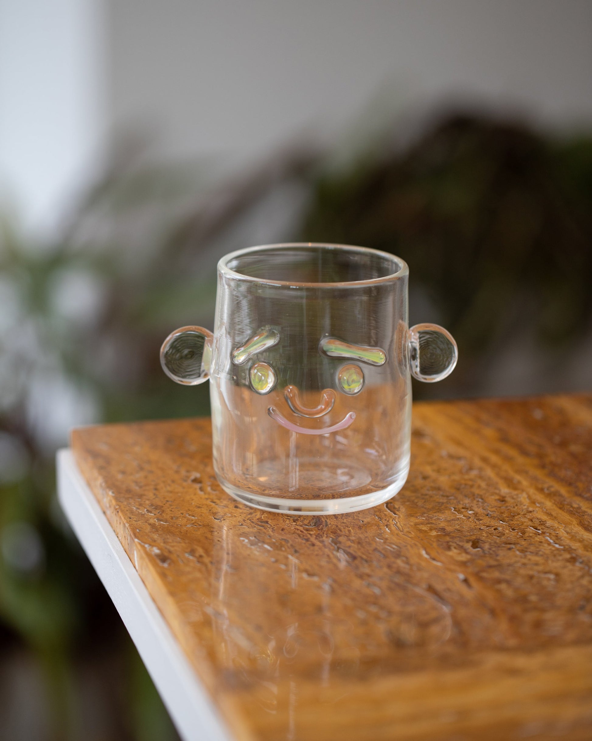 Styled image featuring the TAK TAK Goods Smiley Face Cup.