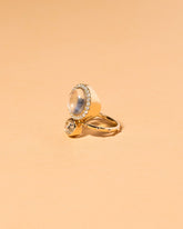  Moonstone & Diamond Cluster Ring on light color background.