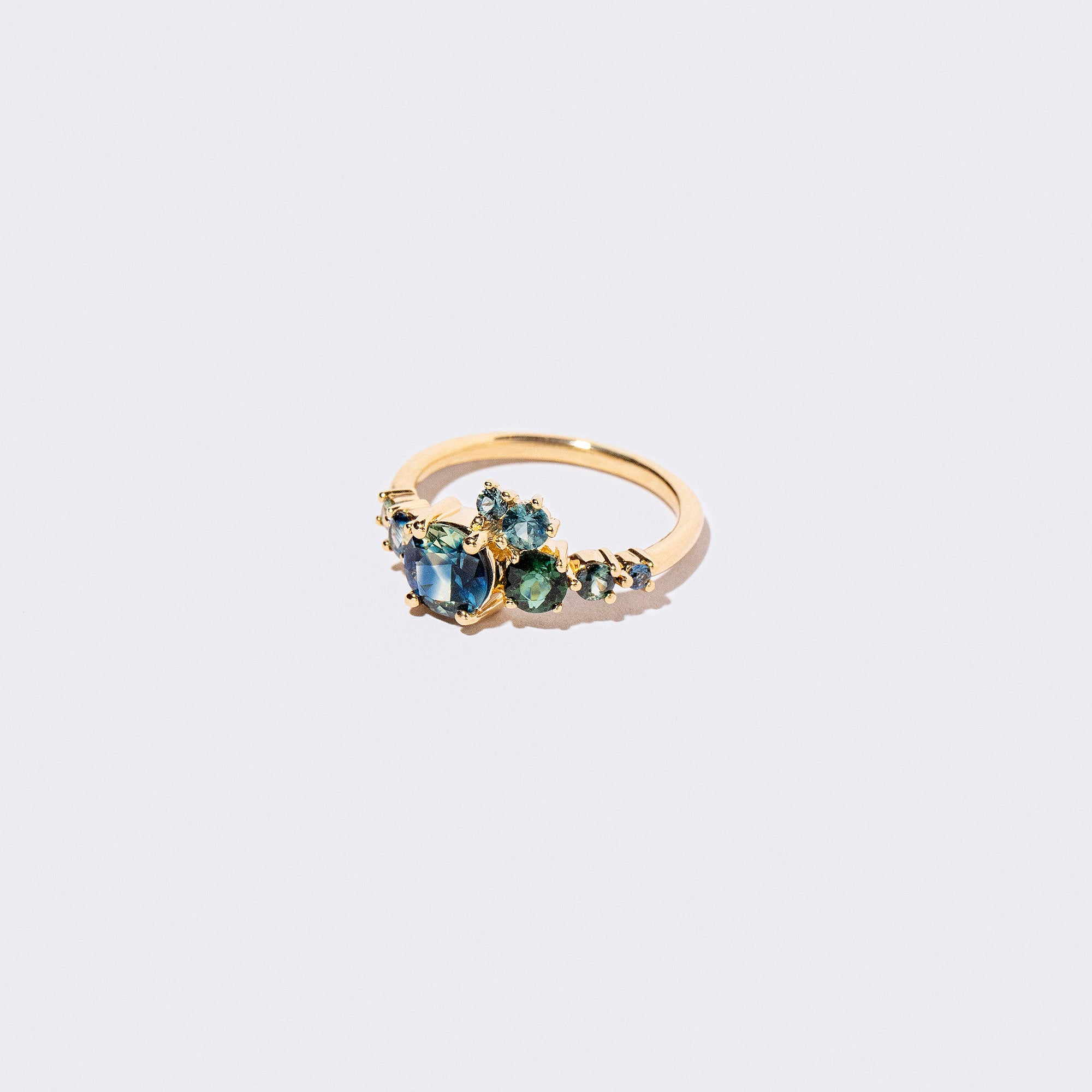 product_details:: Luna Ring - Bicolor Sapphire on light color background.