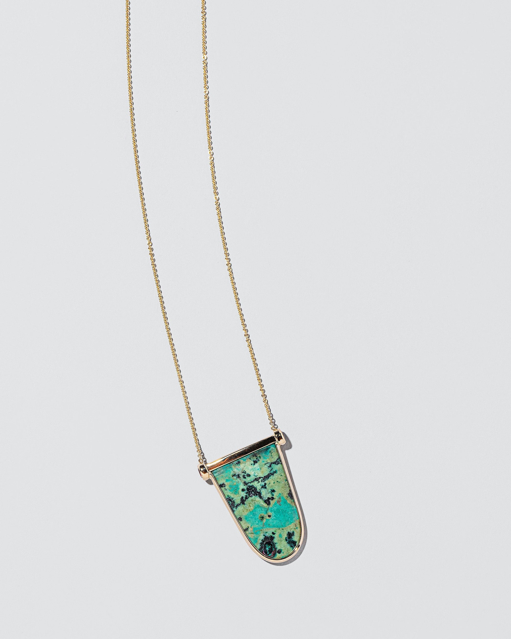  Chrysocolla Tongue Necklace on light color background.