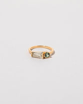  Merret Ring on light color background.