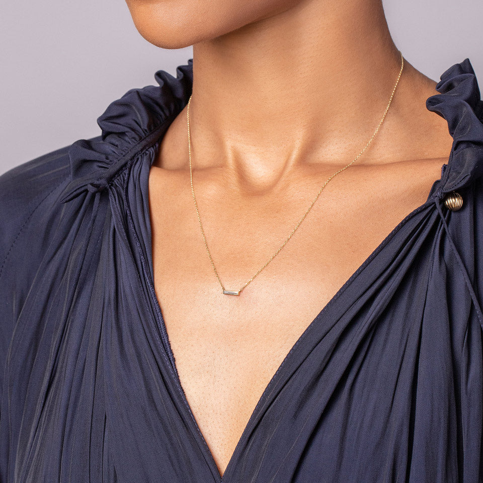 product_details::Cayo Necklace on model.