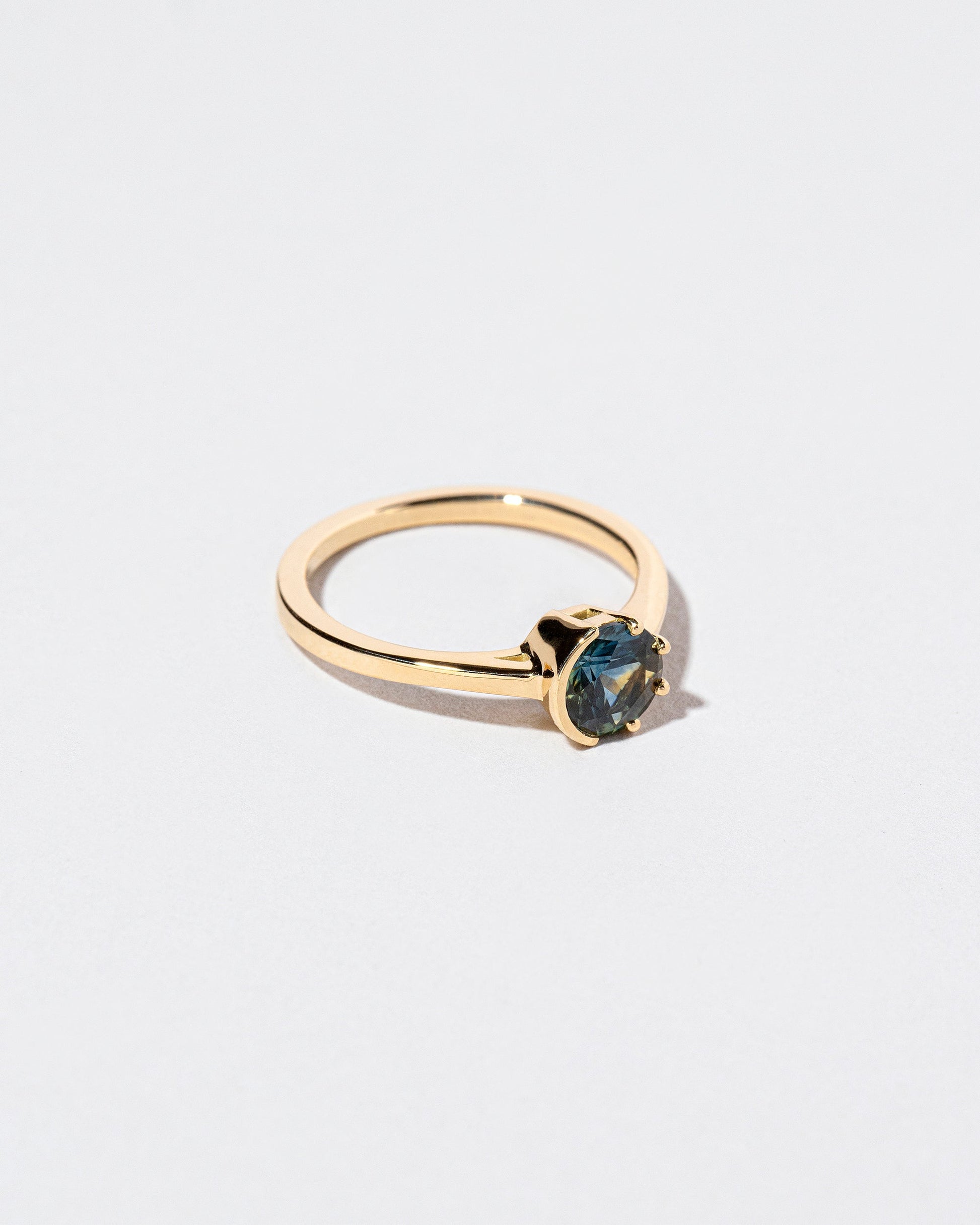  Sun & Moon Ring - Bicolor Teal Sapphire on light color background.