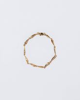  Accumulation Bracelet on light color background.